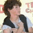 A pixelated image of a person with curly brown hair wearing a black vest over a white shirt, positioned next to bright pink text reading "I RATHER LISTEN TO THE JONAS BROTHER: THE LISTEN YOU AND YOUR PROBLEMS".