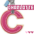 Pixelated icon with pink 'C' shape, blue and gray mechanical top, red text banner reading CHARLOTTE, three small heart symbols below.