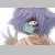 Pixelated image of a figure with purple hair, light blue clothing, and brown lower body against a white background with faint green and blue elements.