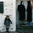 A pixelated image divided into four quadrants showing a child near a building, two figures in dark cloaks, and text reading "Brand New" and "Fight Off Your Demons."