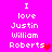 A bright pink background displays white pixelated text reading "I love Justin William Roberts" with a red heart symbol replacing the 's' in Roberts on one side and a smaller pink heart on the other.