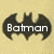 Two side-by-side Batman symbols on a beige background, one with 'Batman' text overlay and the other without.