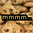 A static image of a cookie-themed background with overlaid text reading 'mmmm... cookies!' in pixelated font.