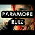 A static image of a person with red hair and orange clothing, overlaid with text reading "PARAMORE" above "RULZ" in bold white letters on black rectangles.