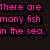 A cartoon clownfish with orange body and white stripes swims in blue water, accompanied by pink text about fish and NEMO.