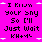Pixelated text on bright pink background with white starbursts, repeating 'I Know Your Shy So I'll Just Wait KN+MY' in two