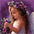 A pixelated figure with light brown hair wears a white top and holds a bouquet of purple and white flowers against a purple background.