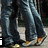 Animated sequence showing two figures in dark blue jeans walking side-by-side, with text overlays changing from 'i' to 'love you <3'.