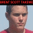 Static pixelated image of a person with short dark hair wearing a red shirt against light blue background, top banner text in red block letters.