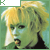 Animated sequence of a person with blonde hair and green-tinted skin holding an orange object near their mouth against a teal background.