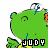 Green cartoon character with closed eyes and blue tears, wearing yellow shirt, displaying 'JUDY' text below.