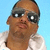Two side-by-side pixelated portraits of individuals against contrasting backgrounds, one light blue and the other dark.