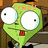 Green cartoon character with large white eyes and a red mouth, displaying the word 'CRAZY' in orange text above its head against a brown background.