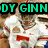 Pixelated image of a person in white clothing with red accents, featuring green text reading "DY GINN" on black background.