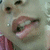 A close-up of a person's mouth and nose with lips parted showing teeth, displayed in a of four with slight variations in mouth position