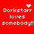 Red background with white pixelated text reading "Dorkstarr loves somebody!!" and four distinct pixel art symbols above the text.