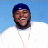Static 48x48 pixel icon showing a person with dark skin wearing a blue cap and white shirt against a light blue background, rendered in low-resolution pixel art style with visible dithering.