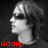 Black-and-white profile image of a person with long hair and sunglasses, overlaid with red pixelated text reading "Adam is amazing." in four quadrants.