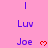 Pink background with blue text 'Luv' and 'Joe' and red heart symbols in a pattern, animated to cycle through heart positions