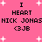Pink background with white starbursts; black text reads "I HEART NICK JONAS <3JB" in two identical horizontal