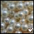 Two side-by-side pixelated images of a textured surface with scattered light reflections, each featuring a small heart icon at the bottom center.