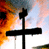 Animated contact sheet showing two frames of a buddy icon with a cross silhouette against fiery sky and CoolBuddy.com text on blue background.