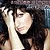 A contact sheet of five animated frames showing a woman with long dark hair and a hat, alongside text variations on the name "ASHLEE" in different colors and backgrounds.