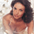 Static 48x48 pixel icon showing a woman with long dark hair in a light-colored top, cropped to upper body against a white background.
