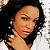 Static 50x50 pixel buddy icon showing a close-up of a person with dark curly hair and light brown skin tone, cropped to show upper shoulders and face against a white background.