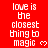Red background with white pixelated text repeating 'love is the closest thing to magic' and small white heart symbols, arranged in a pattern with a gray rectangular overlay at the bottom right