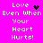 A bright pink background displays white pixelated text reading "Love Even When Your Heart Hurts!" with animated black heart symbols replacing the word "Heart."
