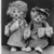 Two grayscale cartoon figures stand side-by-side on a dark background, with text below reading "Thats how we roll" in white letters on blue.