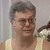 A man in a yellow tank top appears across four with subtle facial expression changes and background variations