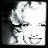 Pixelated grayscale image of a stylized human face with exaggerated features and high contrast, rendered in low resolution on a black background.