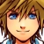 Pixelated anime-style portrait of a character with light brown hair, blue eyes, and a neutral expression wearing a blue shirt.