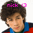 Pixelated image of a person with dark curly hair wearing a blue and red jacket, with pink text 'nick' and a heart symbol above the head.