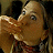 A 48x48 pixel buddy icon featuring a split composition with a person on the left and red text "Along Came Polly" on the right, displayed as part of an animated contact sheet.