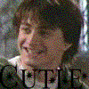 A four- shows a person with dark hair and light clothing against a blurred background, each displaying the word "CUTIE" in different colors