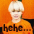 Pixelated image of a person with light hair wearing an orange shirt against an orange background, with text below reading 'hehe...' in dark letters.