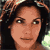 Static pixelated image of a person's face with dark hair and light skin tone, displayed as a 256x256 buddy icon on a transparent background.
