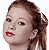 Pixelated close-up of a person's face with brown hair tied back, red lips, and visible facial features against a white background.