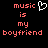 Pixelated text reads 'music is my boyfriend' in red on black background with a white heart symbol above the word 'is'.