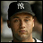Pixelated close-up of a person wearing a dark cap with white 'NY' logo, light skin tone, and blurred background.