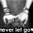 Black-and-white image of a person's torso and hands with text overlay, showing subtle hand position changes across frames.