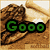 A pixelated image of a chocolate chip cookie on a wooden surface with a rolling pin, overlaid by green and white text.