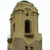 Pixelated tower with rounded top, dark rectangular opening, and small circular detail, rendered in earthy brown tones on white background.