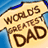 A pixelated sign with brown text reading 'WORLD'S BEST DAD' on a beige background, bordered by blue and black edges.