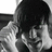 Black-and-white pixelated image of a person with dark hair resting their head on one hand, next to green background with white text reading 'what you see is what you get'.