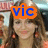 A person with long brown hair appears in three distinct frames with different colored text overlays: orange 'vic', purple 'TORI', and red 'OUS'.