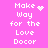 Pixelated text on pink background with animated heart and sparkle effects replacing punctuation in 'Make Way for the Love Docr' phrases.